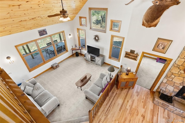 582 Buddy Rd, Bailey, CO 80421 - living area featuring ceiling fan, high vaulted ceiling, plenty of natural light, and wood finished floors