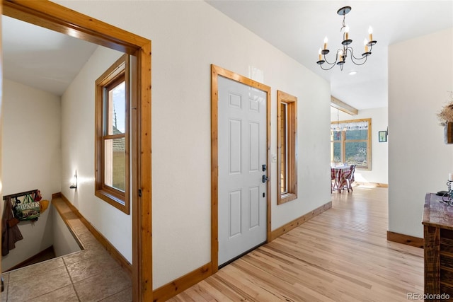 582 Buddy Rd, Bailey, CO 80421 - entryway with recessed lighting, baseboards, a chandelier, and light wood-style floors