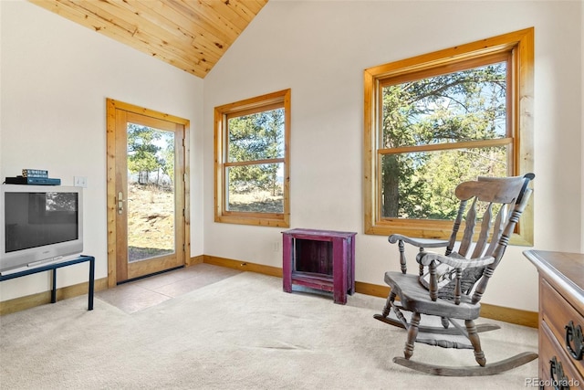 582 Buddy Rd, Bailey, CO 80421 - sitting room featuring baseboards, light carpet, vaulted ceiling, and a wealth of natural light