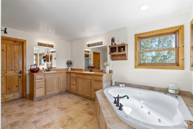 582 Buddy Rd, Bailey, CO 80421 - full bath with double vanity, tile patterned floors, a tub with jets, and a sink