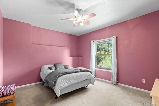 582 Buddy Rd, Bailey, CO 80421 - carpeted bedroom with baseboards and ceiling fan
