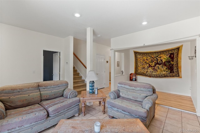 582 Buddy Rd, Bailey, CO 80421 - living room with stairway, light tile patterned floors, baseboards, and recessed lighting