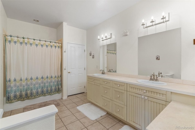 582 Buddy Rd, Bailey, CO 80421 - bathroom featuring a sink, tile patterned floors, shower / bathtub combination with curtain, and double vanity
