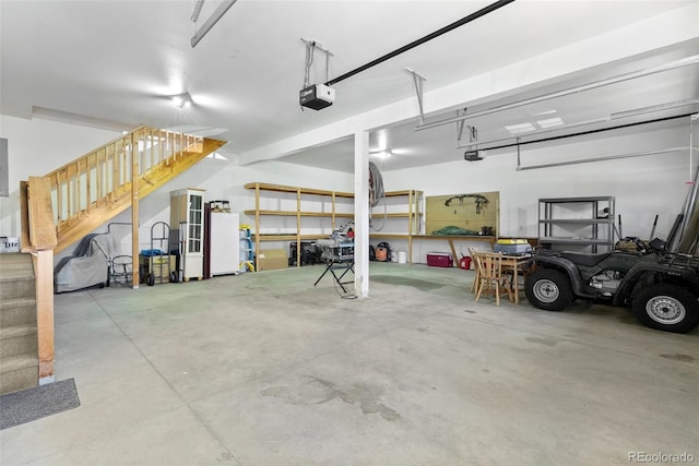 582 Buddy Rd, Bailey, CO 80421 - garage featuring a garage door opener