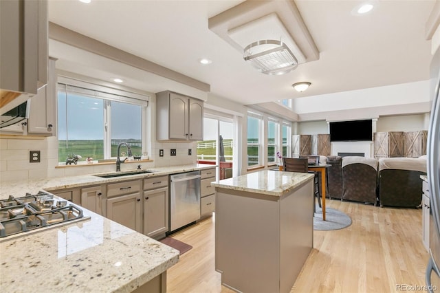 11960 Conestoga Trl, Elbert, CO 80106 - kitchen with a sink, stainless steel appliances, a center island, decorative backsplash, and recessed lighting