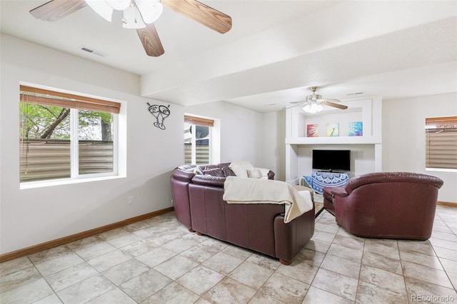 11960 Conestoga Trl, Elbert, CO 80106 - living area with ceiling fan, baseboards, and light tile patterned floors