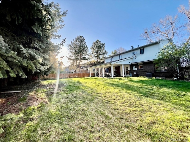 view of yard with fence