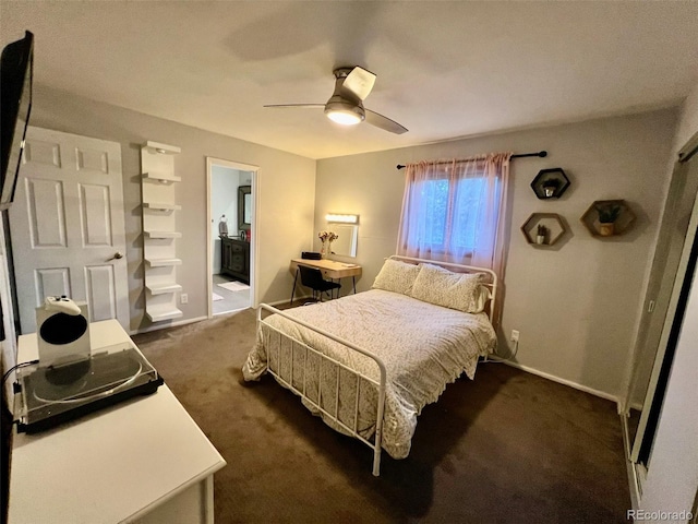 bedroom featuring connected bathroom, ceiling fan, baseboards, and dark carpet
