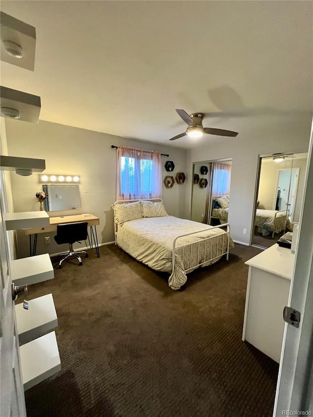bedroom featuring ceiling fan, baseboards, and dark colored carpet