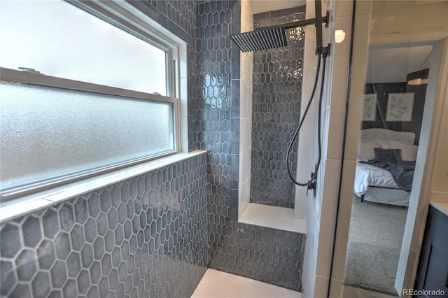 bathroom featuring a tile shower