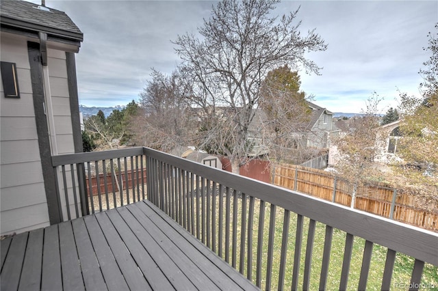 wooden deck with a yard