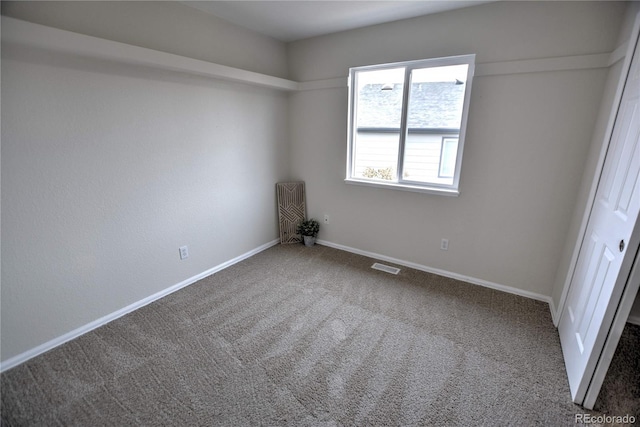 view of carpeted spare room