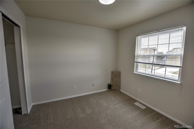 unfurnished bedroom featuring carpet flooring