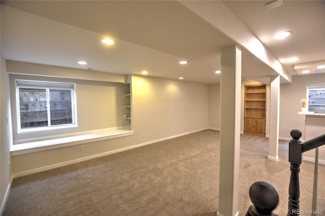 basement featuring carpet flooring