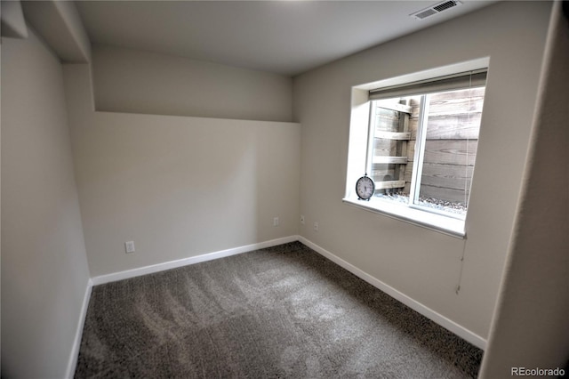 view of carpeted spare room