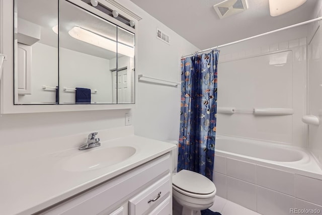 full bathroom featuring vanity, tile patterned flooring, toilet, and shower / bath combo