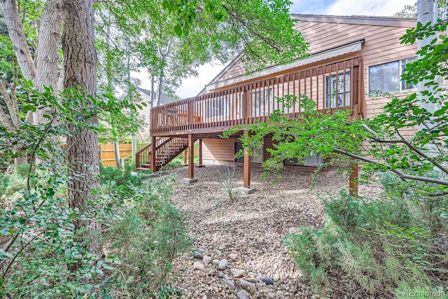 view of yard featuring a wooden deck