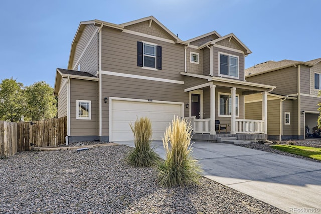 craftsman-style house featuring a garage and a porch