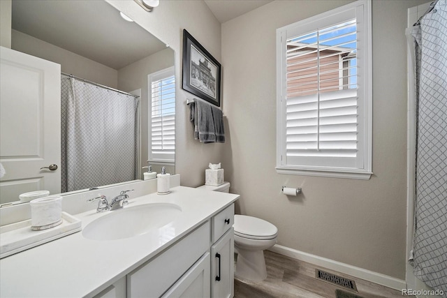 8908 Birch Run Ln, Parker, CO 80134 - bathroom featuring wood finished floors, vanity, and curtained shower