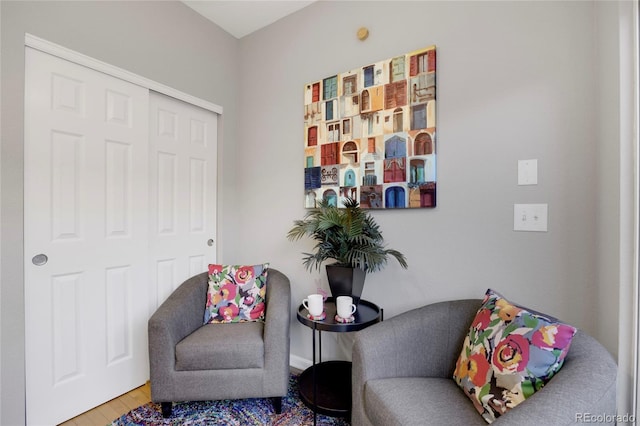 sitting room with wood finished floors