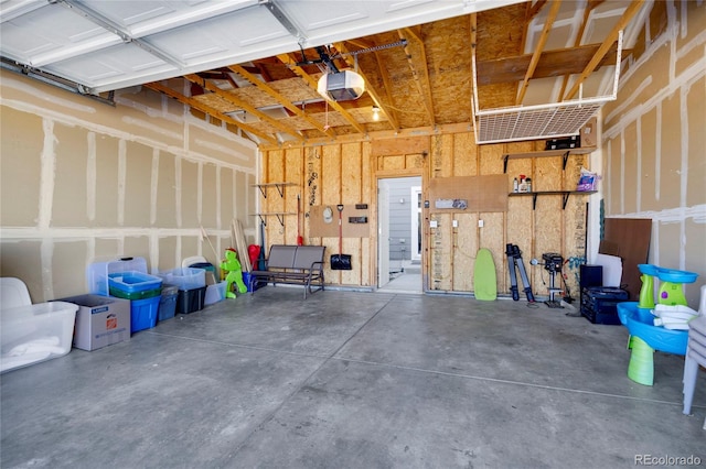 garage featuring a garage door opener