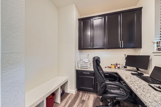 10991 Xanadu St, Commerce City, CO 80022 - home office with wood finished floors and built in study area