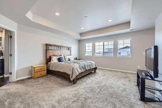 10991 Xanadu St, Commerce City, CO 80022 - carpeted bedroom featuring a raised ceiling and recessed lighting