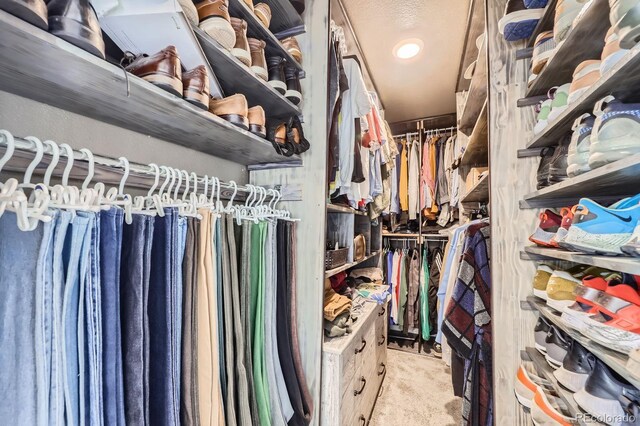 10991 Xanadu St, Commerce City, CO 80022 - walk in closet with carpet flooring