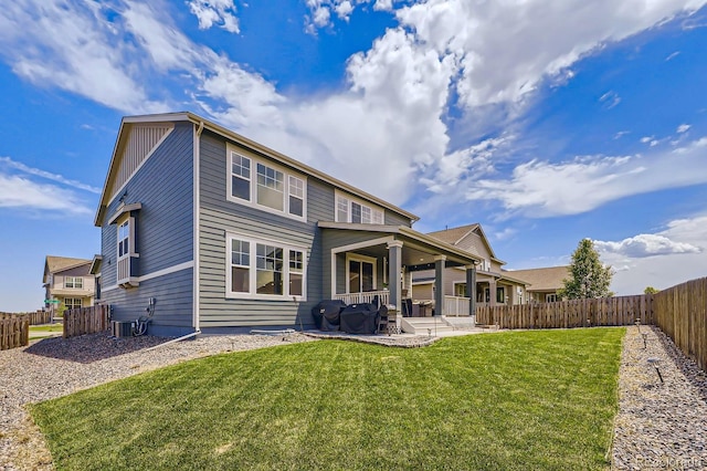 10991 Xanadu St, Commerce City, CO 80022 - rear view of house featuring a patio area and a fenced backyard