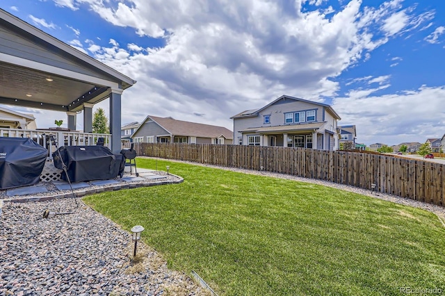 10991 Xanadu St, Commerce City, CO 80022 - fenced backyard with a patio area and a residential view
