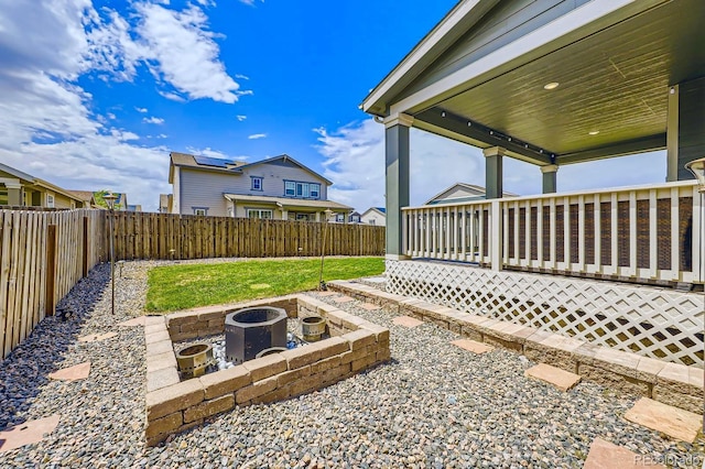 10991 Xanadu St, Commerce City, CO 80022 - fenced backyard featuring a fire pit