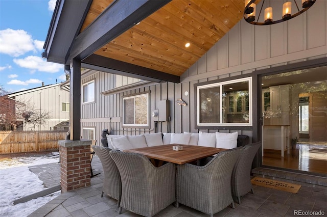 view of patio with fence and outdoor lounge area