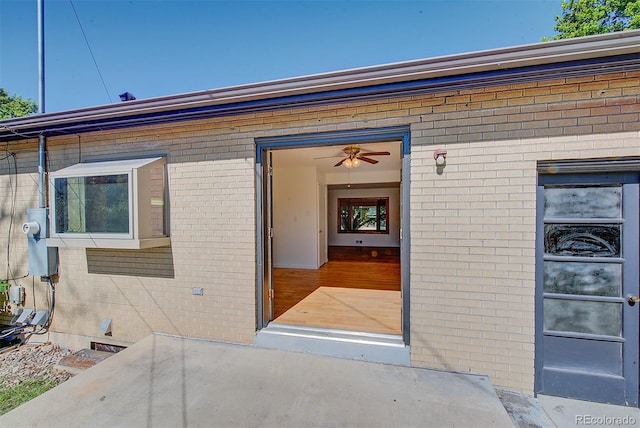 6054 Iris Way, Arvada, CO 80004 - property entrance featuring brick siding