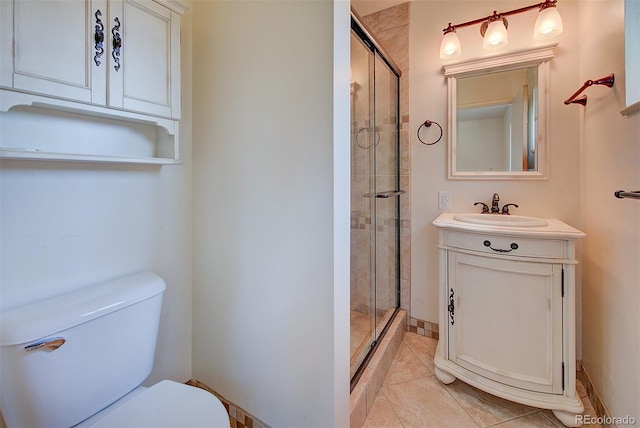 6054 Iris Way, Arvada, CO 80004 - full bathroom with a shower stall, vanity, and tile patterned flooring