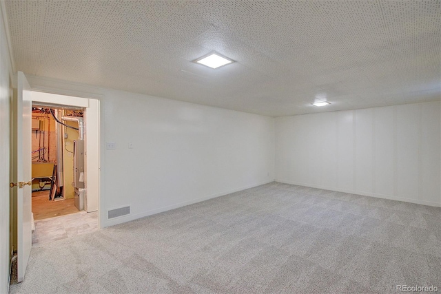 6054 Iris Way, Arvada, CO 80004 - finished below grade area with light colored carpet and a sink