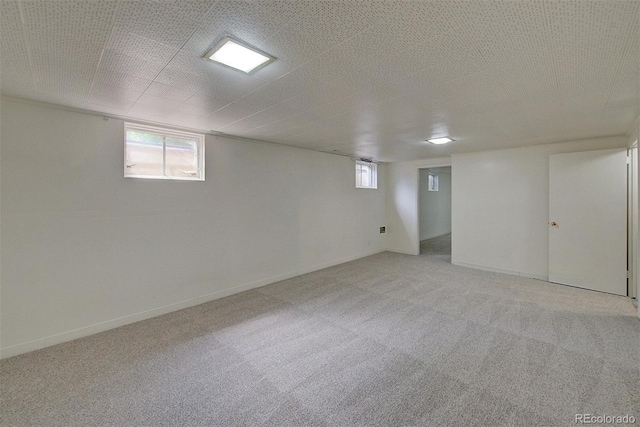 6054 Iris Way, Arvada, CO 80004 - basement featuring light carpet