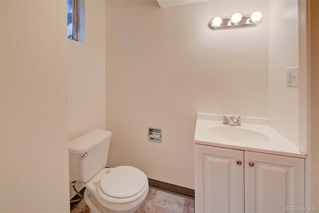 6054 Iris Way, Arvada, CO 80004 - bathroom with toilet and vanity