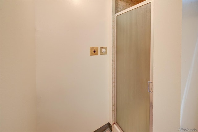 6054 Iris Way, Arvada, CO 80004 - bathroom featuring a shower stall