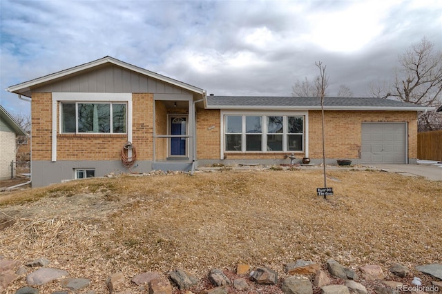 single story home featuring a garage