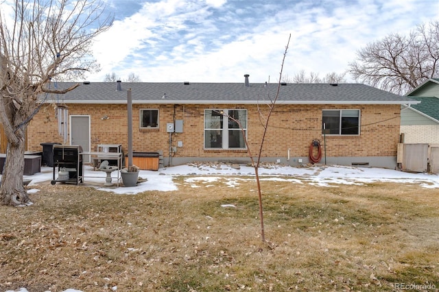 back of house with a yard