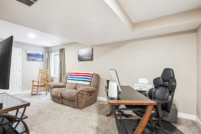 office space with visible vents, baseboards, and carpet floors