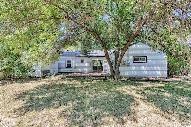 3052 S Grape Way, Denver, CO 80222 - ranch-style house featuring a front lawn