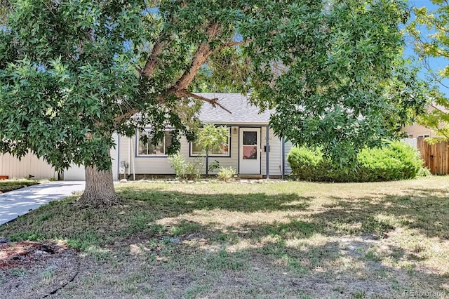 3052 S Grape Way, Denver, CO 80222 - obstructed view of property featuring concrete driveway and roof with shingles