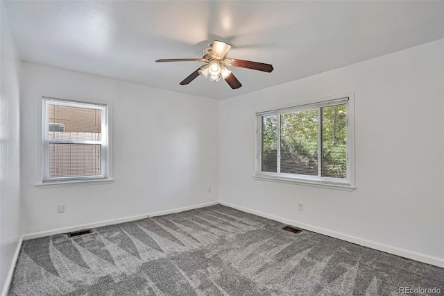 3052 S Grape Way, Denver, CO 80222 - carpeted empty room with a ceiling fan and baseboards