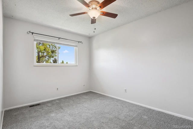 2554 S Laredo Ct, Aurora, CO 80013 - empty room with carpet, a textured ceiling, baseboards, and a ceiling fan