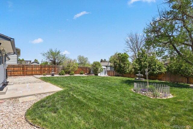 2554 S Laredo Ct, Aurora, CO 80013 - view of yard featuring a patio