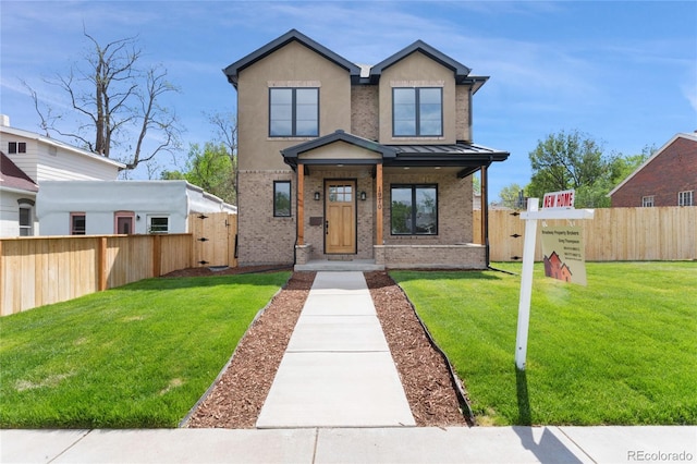 1970 S Logan St, Denver, CO 80210 - view of front facade with brick siding, a standing seam roof, and metal roof