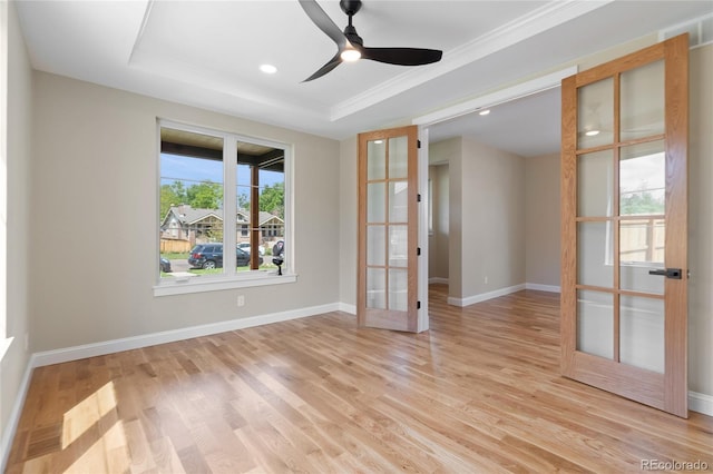1970 S Logan St, Denver, CO 80210 - unfurnished room featuring french doors, light wood-style floors, baseboards, ceiling fan, and crown molding