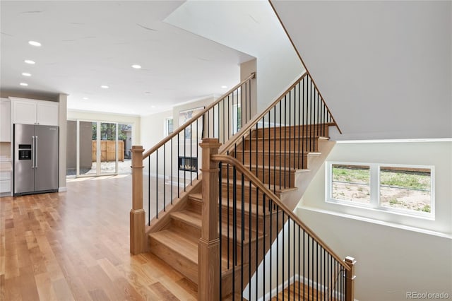 1970 S Logan St, Denver, CO 80210 - stairs featuring wood finished floors and recessed lighting