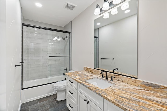 1970 S Logan St, Denver, CO 80210 - full bath featuring toilet, enclosed tub / shower combo, vanity, and recessed lighting